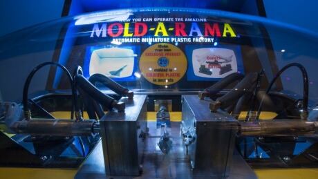 A Mold-A-Rama machine. Only about 200 of the machines were ever made. A family owned, U.S. business is suing a collector and B.C.-based seller for allegedly buying several of the original, decades-old machines and outfitting them with modern, 'non-Mold-A-Rama' parts. mold a rama