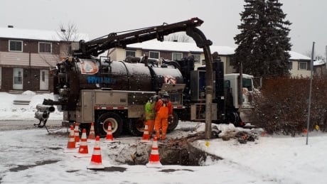 Workers attempt to repair a damaged gas line in east Ottawa on Jan. 18, 2019. Some 550 Enbridge customers are without heat because of the damage, the company says. damage gas line ottawa enbridge