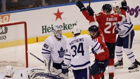 Florida's Nick Bjugstad celebrates one of his team's goals in front of Toronto goalie Garret Sparks in the Panthers' 3-1 win on Friday. Maple Leafs Panthers Hockey