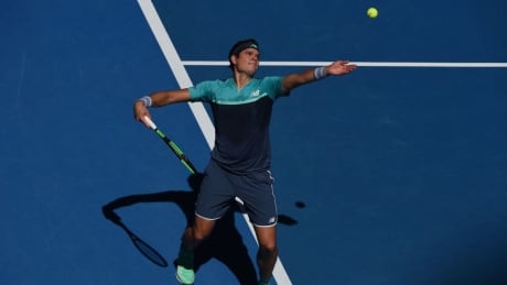 Canada's Milos Raonic serves to France's Pierre-Hugues Herbert during their third-round match. raonic-milos
