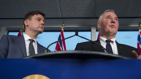 Federal Minister of Border Security and Organized Crime Reduction, Bill Blair speaks as British Columbia Attorney General, David Eby looks on during a news conference in Vancouver, Tuesday, Jan 22, 2019. Minister Blair and Attorney General Eby were speaking about a meeting which they had to try and address concerning money laundering in the province. david eby bill blair money laundering