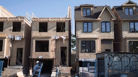 Houses under construction in Toronto on Friday, June 26, 2015. The Building Industry and Land Development Association says the Greater Toronto Area's supply of newly constructed condos last month hit its highest level since it began tracking that data about 15 years ago. The group says that of the 5,377 new homes sold in the GTA in October, about 91 per cent of the units were multi-family homes, condo apartments in high-rise and mid-rise buildings and stacked townhomes, while the remaining nine per cent were low-rise, single-family homes. New Home Sales Toronto 20171123