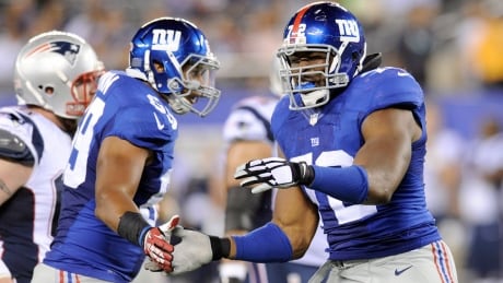 Israel Idonije, right, who played with four teams in the NFL, thinks a relationship with another pro league gives athletes another opportunity to showcase their talents. israel-idonije