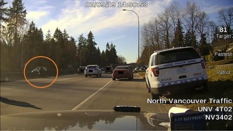 This photograph, provided by North Vancouver RCMP, shows the suspect police are searching for after an officer was knocked down on Highway 1 on Saturday, Feb. 9, 2019. North Vancouver RCMP officer hit by black motorcycle