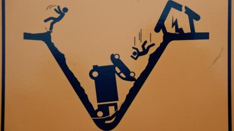 A sign in Sechelt warns of the risk of sinkholes. sinkhole sign