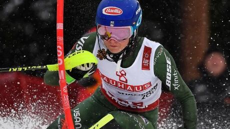 Shiffrin fights through chest cold to win 4th straight world slalom gold