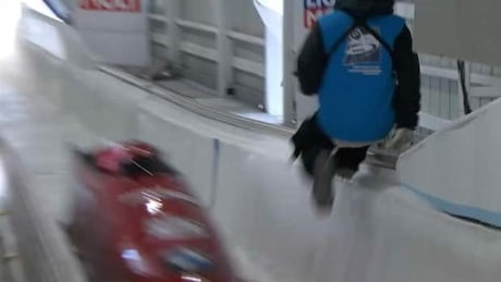 A track worker was nearly flattened in Lake Placid, New York by Monaco's four-man bobsleigh team after jumping onto the track. Track worker comes inches away from being run over by bobsleigh
