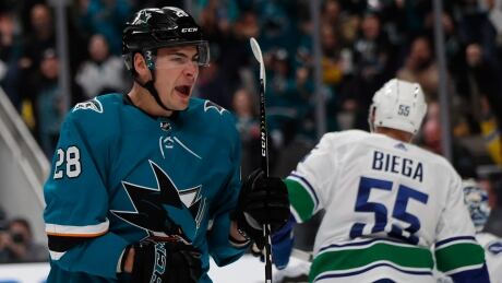 Sharks ride balanced attack past Canucks