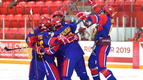 Team Nunavut celebrates a goal in a 5-3 win over Team Yukon, in its first ever game at the Canada Winter Games. Team Nunavut Canada Winter Games