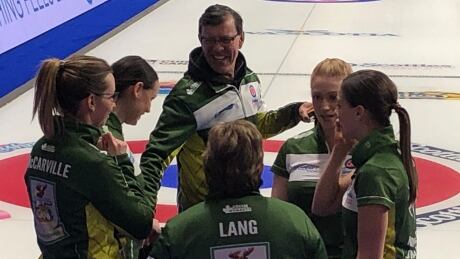 Rick Lang, top, and his wife Lorraine, bottom, are still sharing their love of curling and each other at this year's Scotties in Sydney, N.S. lang-lorraine-rick