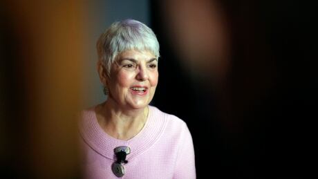 Finance Minister Carole James tours the Our Living Languages exhibit at the Royal B.C. Museum in Victoria on Monday, the day before unveiling the provincial budget. carole james