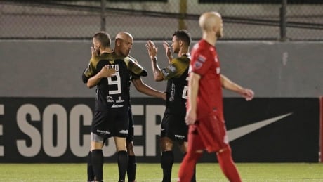Players of Panama's Club Atletico Independiente FC celebrate after defeating Canada's Toronto FC 4-0 during a CONCACAF Champions League soccer match. Panama-Canada