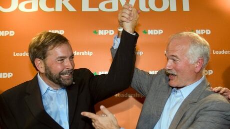 NDP candidate Thomas Mulcair celebrates with party leader Jack Layton, right, after winning the byelection in Outremont riding in Montreal Monday, Sept. 17, 2007. (CP PHOTO/Ryan Remiorz)CANADA Fedceral Byelection 20070917 TOPIX