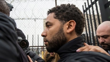 "Empire" actor Jussie Smollett leaves Cook County jail following his release, Thursday, Feb. 21, 2019, in Chicago. Smollett was charged with disorderly conduct and filling a false police report when he said he was attacked in downtown Chicago by two men who hurled racist and anti-gay slurs and looped a rope around his neck, a police official said. (Ashlee Rezin/Chicago Sun-Times via AP) Empire Cast Member Attack