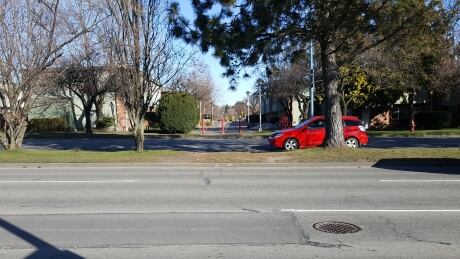 Cars whiz up and down Blanshard Street in Victoria. An unofficial crosswalk, which one councillor says is a vestige of the street alignment back in the 1960s is barely visible. A worn-down patch of grass on the median and metal barricades at the far end show where many residents cross. Some say it has been a long-running safety concern. Blanshard and Kings crossing