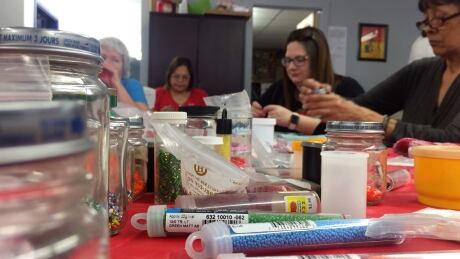 Each beading class at the Awo Taan Healing Lodge is opened with a prayer by a First Nation elder and a traditional smudging ritual. Beading class at Awo Taan Healing Lodge in Calgary