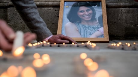 LONDON, ENGLAND - JUNE 11: A photo of Nazanin Zaghari-Ratcliffe is seen amongst candles during a fourth birthday vigil for her daughter Gabriella opposite the Foreign & Commonwealth Office, King Charles Street, London, SW1A on June 11, 2018 in London, England. Richard Ratcliffe has not seen his wife Nazanin Zaghari-Ratcliffe, 38, or daughter Gabriella, 4, since March 2016 when they flew to Iran to visit Nazanin's parents. At the airport on their return to London, Nazanin was arrested while Gabriella's passport was detained, both remain in Iran. 100300848