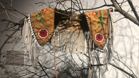 Shawl of a Kukum, 2015 by Diane Blacksmith features materials such as moose hide, beaded pearls with cotton string, and birch. Missing or Forgotten