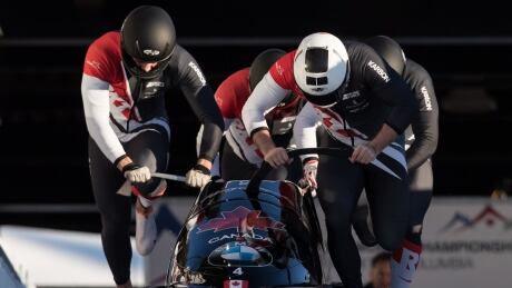 Canada's Justin Kripps, Ryan Sommer, Cameron Stones and Ben Coakwell race down the track on their third run during their bronze-medal performance in four-man bobsleigh at the world championship on Saturday in Whistler, B.C. kripps-justin-030919