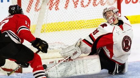 Alex Dubeau, seen above earlier this week, made 32 saves to help the University of New Brunswick to a 4-2 win over Alberta in the U Sports men's hockey final on Sunday in Lethbridge, Alta. usports-hockey-championship-