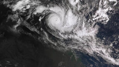 Australia moving 2,000 people out of powerful cyclone's path
