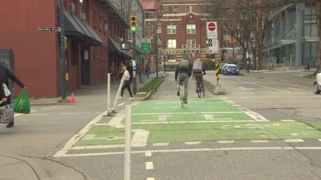 Cyclists and pedestrians using Vancouver's Comox-Helmcken Greenway on March 23, 2018 comox greenway