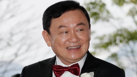 Former Thai Prime Minister Thaksin Shinawatra welcomes his guests for the wedding of his youngest daughter Paetongtarn "Ing" Shinawatra at a hotel in Hong Kong, Friday, March 22, 2019. (AP Photo/Kin Cheung) Hong Kong Thailand Thaksin