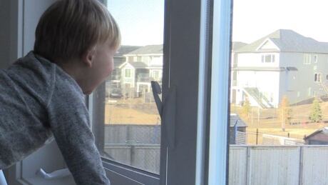 child at window 