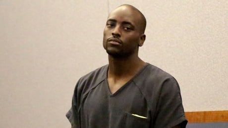 Former CFL and NFL player Cierre Wood appears in court on Tuesday in Las Vegas. Wood, arrested on suspicion of child abuse, now faces murder charges after his girlfriend's 5-year-old daughter died. Ex NFL Player Murder Charge