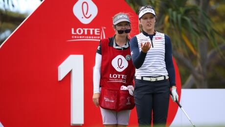 Canada's Brooke Henderson discusses her tee shot on the 11th hole with caddie and sister Brittany during Thursday's second round of the Lotte Championship in Hawaii.
av0i3052_2019041852829595.jpg