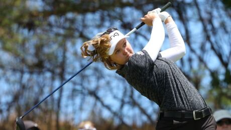 Canada's Brooke Henderson watches her drive on the fifth hole during the third round of the Lotte Championship on Friday. henderson-brooke