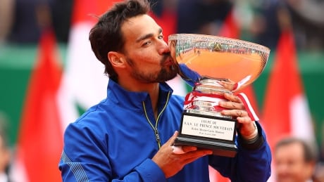 Fabio Fognini of Italy kisses the winner’s trophy after his straight-sets victory against Dusan Lajovic of Serbia in the men's final Sunday at the Monte Carlo Masters in Monaco. fognini-fabio-190421-1180