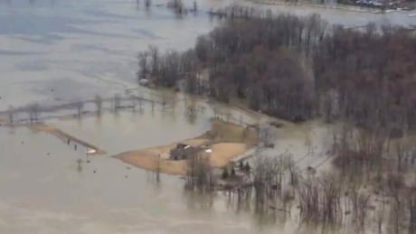 A building sits completely surrounded by water on the Ottawa River as river levels remain high across the region. flooding ottawa river gatineau western quebec