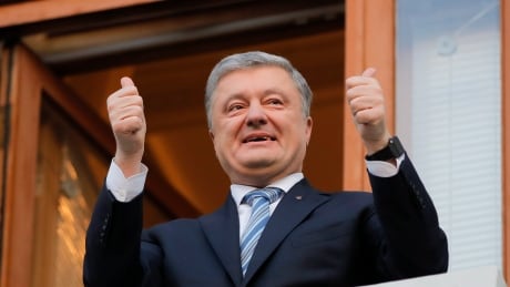 Ukrainian President Petro Poroshenko gestures as he greets his supporters who have come to thank him for what he did as a president, in Kiev, Ukraine, Monday, April 22, 2019. Political mandates don't get much more powerful than the one Ukrainian voters gave comedian Volodymyr Zelenskiy, who as president-elect faces daunting challenges along with an overwhelming directive to produce change. (AP Photo/Vadim Ghirda) Ukraine Election