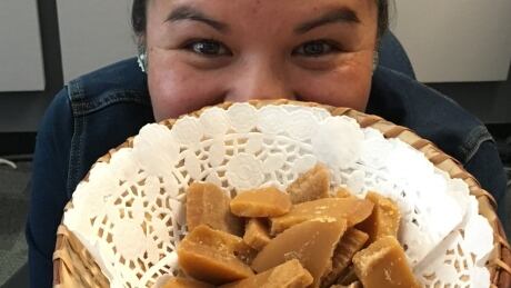 Cezin Nottaway with her Pikoodinigan. Maple toffee