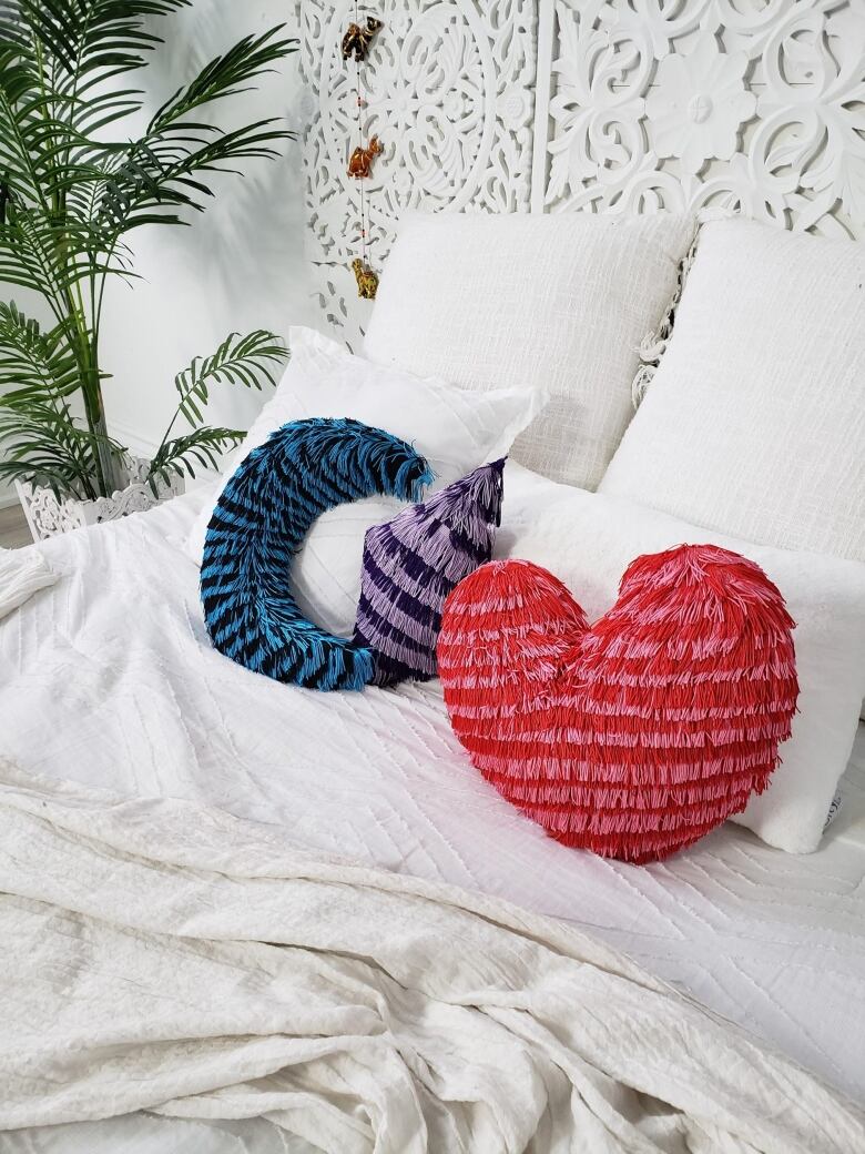 Turn a plain piece of fabric into a fun, fringecovered throw pillow