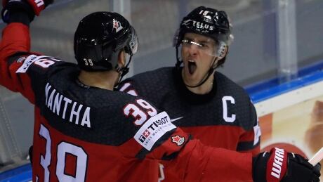 Kyle Turris, right, celebrates with Canadian teammate Anthony Mantha after scoring the team's second of three goals in its 3-0 victory over the United States at the men’s world hockey championship on Tuesday in Kosice, Slovakia. turris-kyle-190521-1180