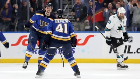 Sammy Blais celebrates his first-period goal with Robert Bortuzzo in the St. Louis Blues' 5-1 win on Tuesday, eliminating the San Jose Sharks in the Western Conference final. 1150838503