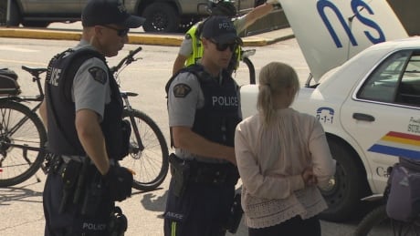 Surrey RCMP officers make an arrest near Surrey Central SkyTrain Station. Surrey-RCMP-Bike-Patrol-Arrest