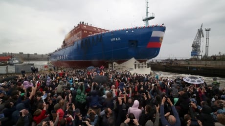 People attend the float out ceremony of the nuclear-powered icebreaker "Ural" at the Baltic Shipyard in St. Petersburg, Russia May 25, 2019. REUTERS/Anton Vaganov - RC132BF09A90 RUSSIA-ARCTIC/ICEBREAKER