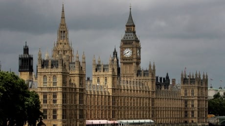 FILE - In this Thursday, July 26, 2007 file photo, a general view of the Houses of Parliament on the river Thames in London. British Prime Minister Theresa May has announced she will step down as leader of the Conservative Party on June 7, 2019 starting a process that will lead to a Conservative Party leadership contest and a new British prime minister who will lead the government during the Brexit process. AP Explains British Politics