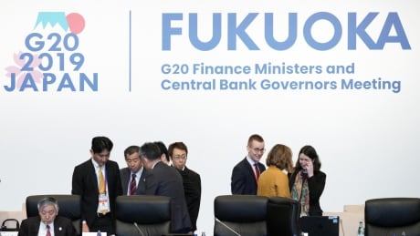 G20 finance chiefs to warn of trade risks, but differ on how 'pressing' they are