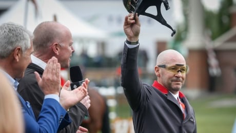 Canada's Eric Lamaze celebrates winning the Grand Prix event of the National at Spruce Meadows in Calgary, Saturday, June 8, 2019. EQU Spruce Meadows 20190608