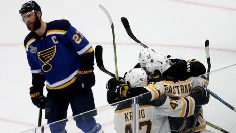 The Boston Bruins celebrate their 5-1 victory over St. Louis in Game 6 while Alex Pietrangelo of the Blues looks on. The Stanley Cup will be decided on Wednesday night in Boston.
Bruins-Blues-060919