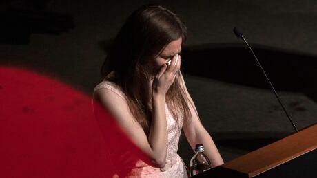 Amanda Knox is overcome with emotion as she delivers a speech during a panel session entitled Trial by Media during her first visit to Italy since she was wrongly convicted of murdering British student Meredith Kercher. 1156064832