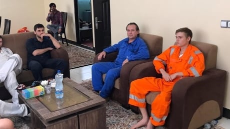 Crew members of the oil tankers which were attacked in the Gulf of Oman in the Arabian Sea, are seen after being rescued by the Iranian rescue team in Jask Port, southern Iran, June 13, 2019. Picture taken June 13, 2019. Tasnim News Agency/via REUTERS ATTENTION EDITORS - THIS PICTURE WAS PROVIDED BY A THIRD PARTY - RC1D9F0976D0 MIDEAST-TANKER/CREW