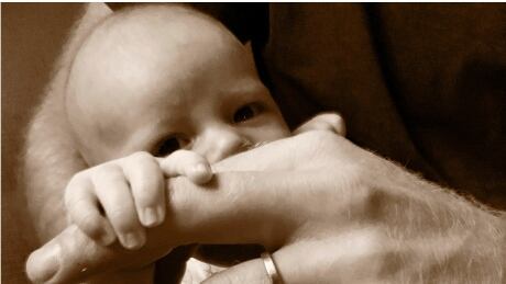In this undated photo issued by Britain's Prince Harry Duke and Duchess of Sussex of their six-week-old son Archie Harrison Mountbatten-Windsor that they shared on their Instagram account @SussexRoyal to mark Father's Day, Sunday June 16, 2019. Prince Harry and Meghan Duchess of Sussex are celebrating their first Father's Day together with their son Archie, by sharing this new sepia toned image showing Prince Harry holding Archie, on their royal Instagram account. (The Duke and Duchess of Sussex/@SussexRoyal via AP) MUST BE USED WITH ORIGINAL TONING AS ISSUED - NO SALES - NO COMMERCIAL USE Britain Royals