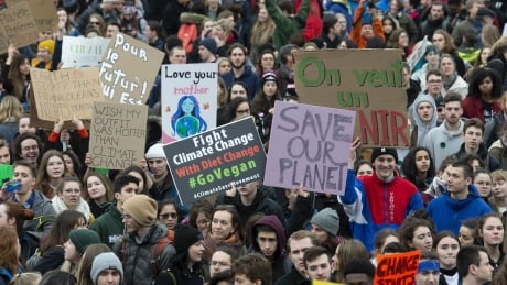Hundreds of students gather on Parliament Hill as they protest climate change, Friday, March 15, 2019 in Ottawa. Climate Students 20190315
