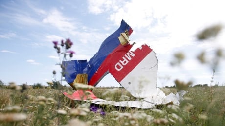 4 charged with murder in 2014 downing of Malaysian airliner over Eastern Ukraine