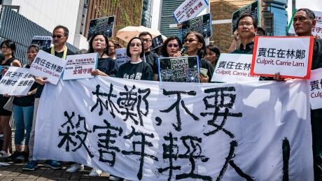 HONG KONG, HONG KONG - JUNE 20: A parent group demonstrate outside the Chief Executive Office to speak with Carrie Lam, Hong Kong's chief executive, on June 20, 2019 in Hong Kong, China. Hong Kong Chief Executive Carrie Lam issued a formal apology but added that the controversial bill will not be scrapped on Tuesday, two days after almost two million people marched in the city to demand for her to step down and withdraw a controversial extradition bill which would allow suspected criminals to be sent to the mainland and place its citizens at risk of extradition to China. (Photo by Anthony Kwan/Getty Images) 1150880666